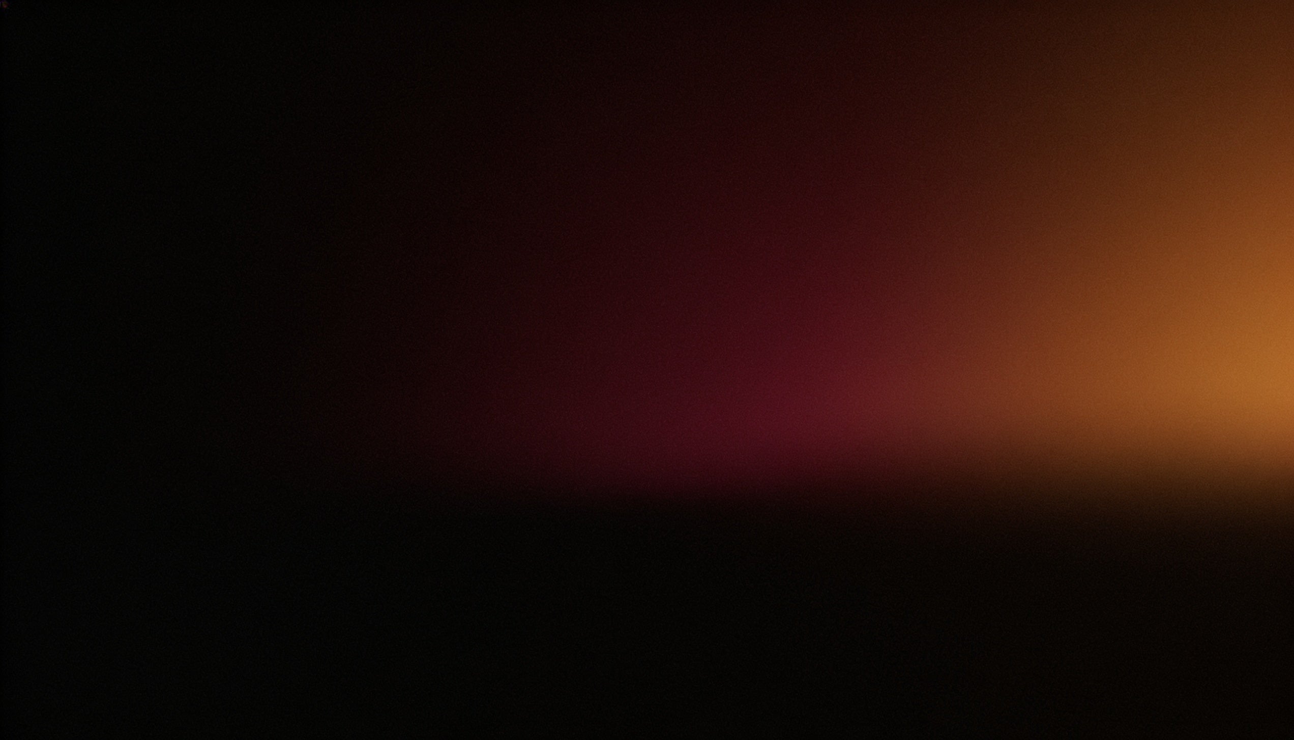 Gradient background transitioning from dark red to orange