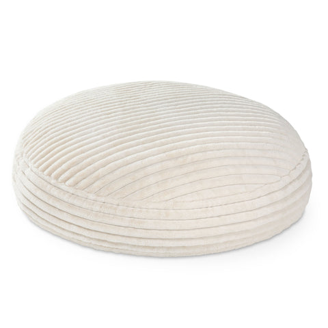Round, beige fabric ottoman on a white background