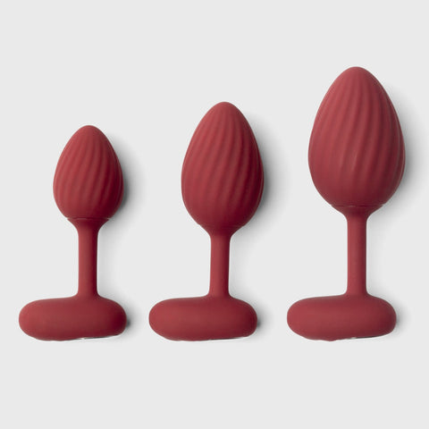 Three pieces of Rouge Training Kit on grey background