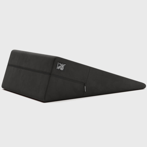 Black ramp pillow with a logo on a white background